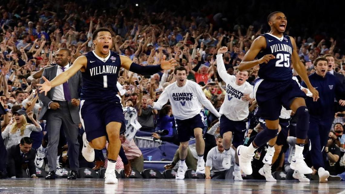 Villanova's Jalen Brunson (1), Mikal Bridges (25) and their teammates celebrate after the NCAA Final Four tournament college basketball championship game against North Carolina, Mon., April 4, 2016, in Houston. Villanova won 77-74.