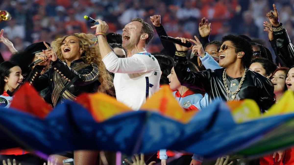 From left, Beyoncé, Coldplay singer Chris Martin and Bruno Mars perform during halftime of Super Bowl 50 between the Denver Broncos and the Carolina Panthers, Sunday, Feb. 7, 2016, in Santa Clara, Calif.