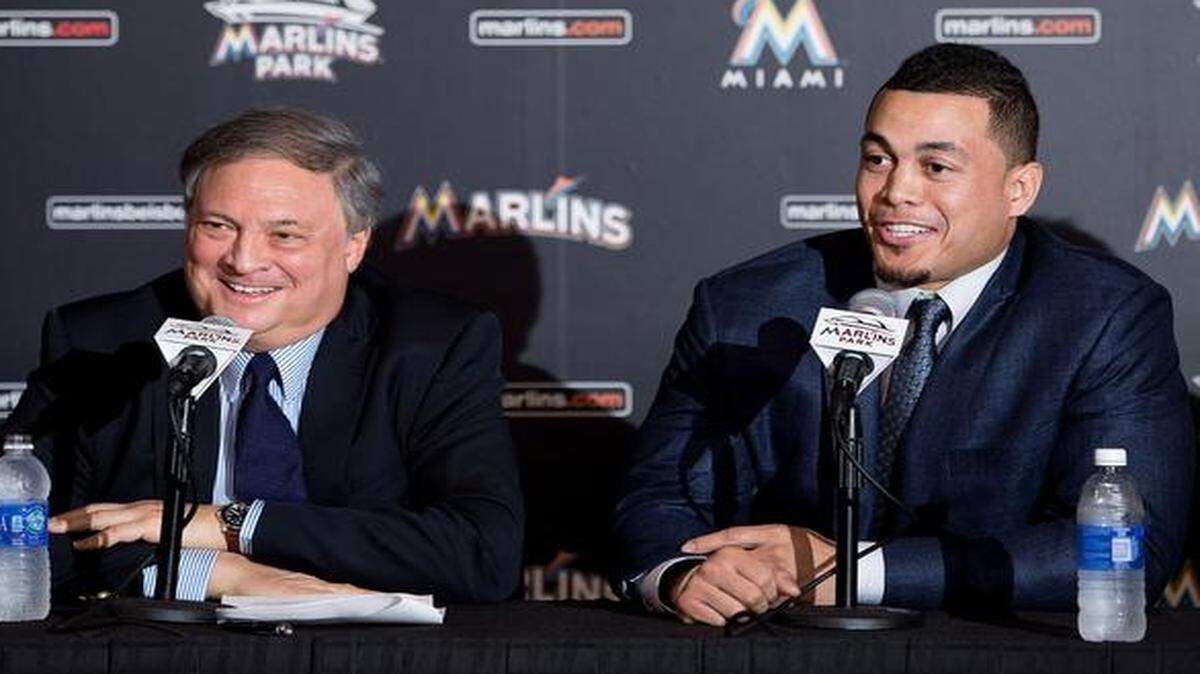 
Giancarlo Stanton of the Miami Marlins speaks as owner Jeffrey Loria looks on during a press conference at Marlins Park on Nov. 19, 2014 in Miami, Florida. 
