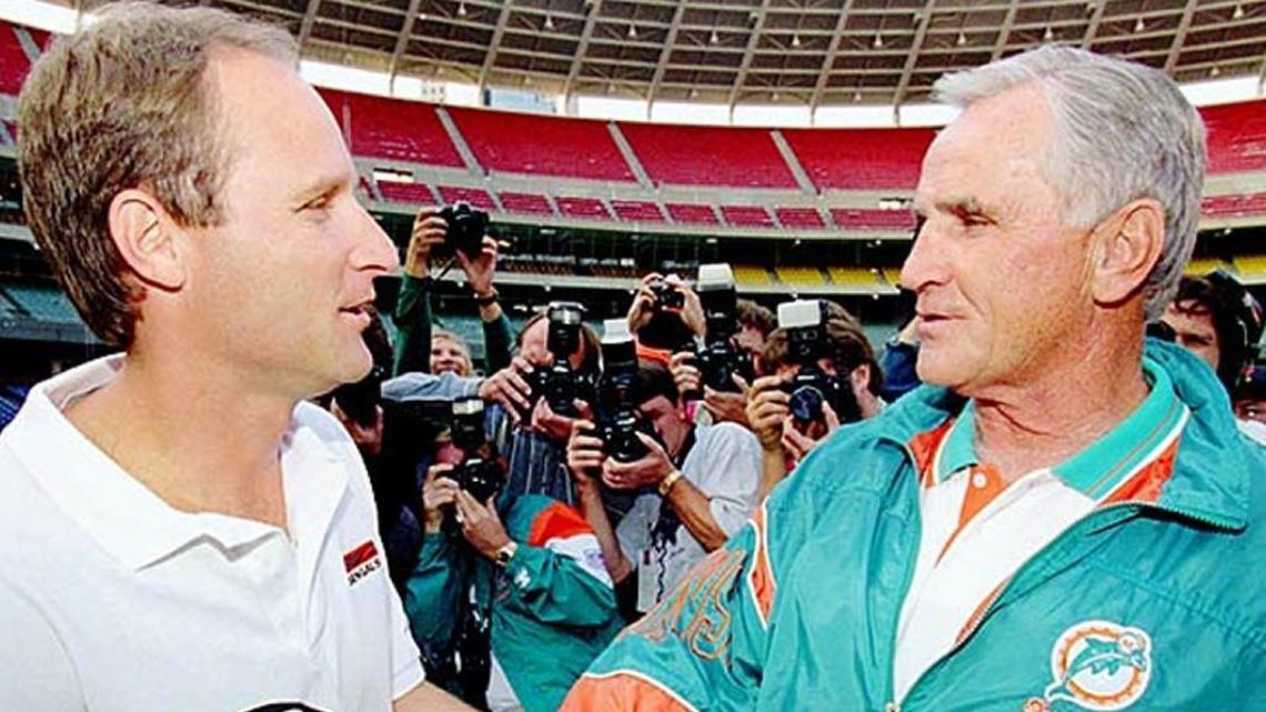 Don and Dave Shula meet before a Dolphins-Bengals game in 1994 in the first-ever father vs. son meeting of NFL head coaches. Don is 88 today and Dave, at 58, has returned to coaching for the first time in 21 years.