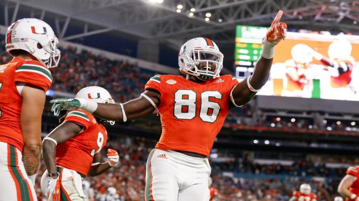 Miami Hurricanes tight end David Njoku (86) celebrates in the end zone after a fourth quarter touchdown as the University of Miami hosts Duke at Hard Rock Stadium in Miami Gardens on Sat., Nov. 26, 2016.