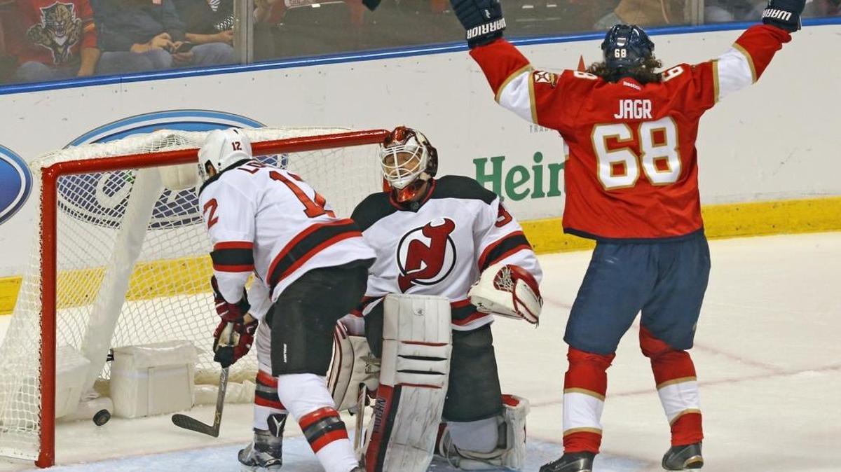 Jaromir Jagr 68, celebrates the Panthers’ first goal of the season by Jonathan Marchessault on Thursday night against the Devils at the BB&T Center in Sunrise.