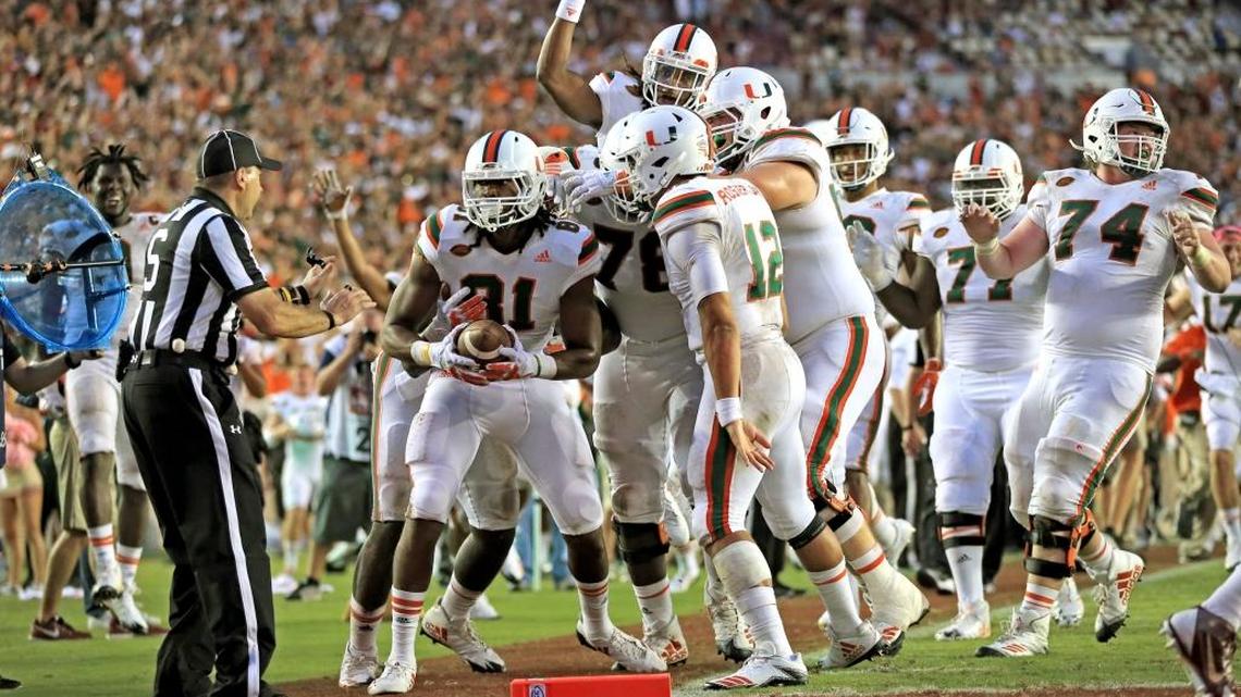 Celebration after Miami Hurricanes wide receiver Darrell Langham (81) scores the final touchdown in the fourth quarter as Florida State Seminoles defensive back Tarvarus McFadden (4) fails to defend as the Seminoles host the Miami Hurricanes at Doak Campbell Stadium in Tallahassee on Saturday, Oct. 7, 2017.
