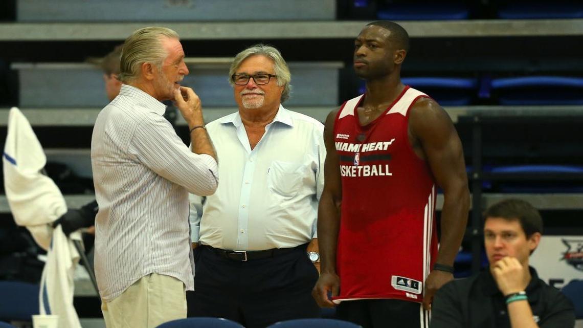 File photo: Miami Heat President Pat Riley, owner Micky Arison, Dwyane Wade and Chief Executive Officer Nick Arison during the second day of the Miami Heat training camp in preparation for the 2015-16 NBA season at FAU Arena on Wednesday, September 28, 2015.
