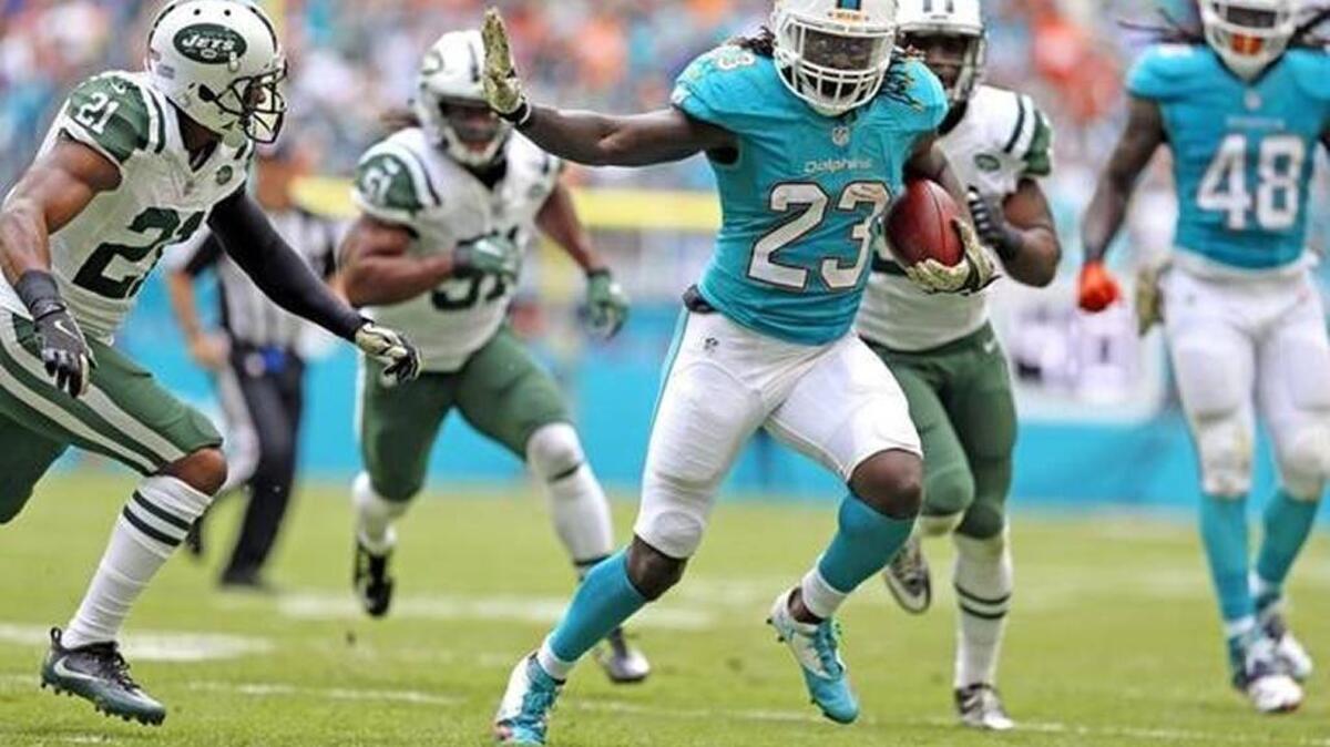Jay Ajayi, shown in action when last Miami hosted the Jets, should be a big reason why the Dolphins will win on Sunday.