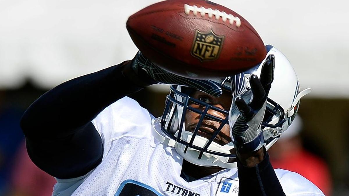Tennessee Titans wide receiver Andre Johnson catches the ball during practice at the NFL football teams training camp, in Nashville, Tenn. Titans' Andre Johnson, a seven-time Pro Bowl selection, is retiring at the age of 35. The Titans issued a release Mon., Oct. 31, 2016, announcing Johnson’s retirement.