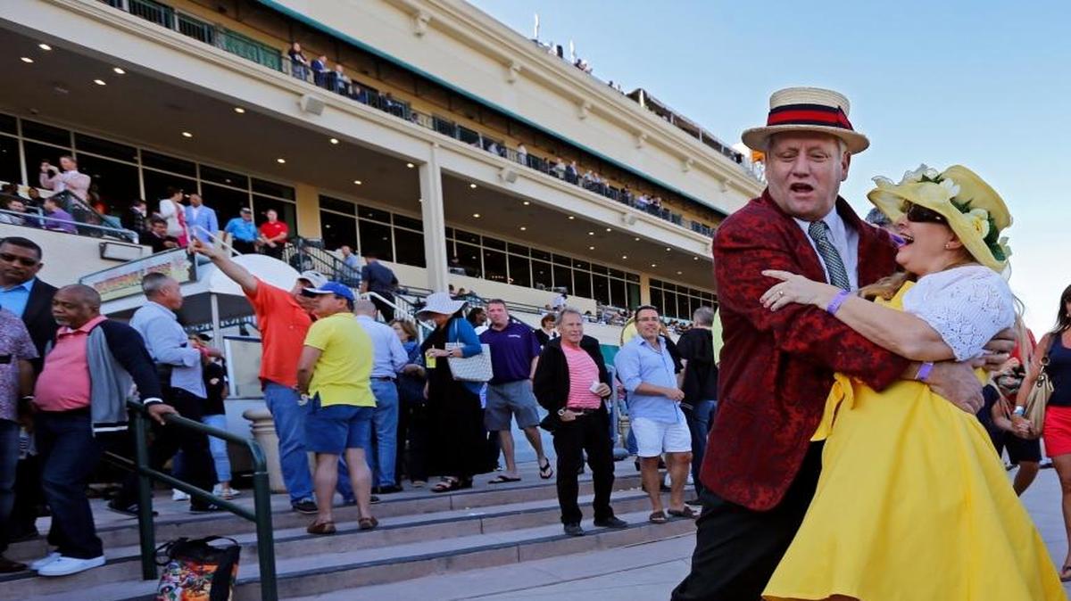 Debi and Michael Reese dance at Gulfstream Park prior to the Pegasus World Cup Invitational in Hallandale Beach on Jan. 28, 2017.