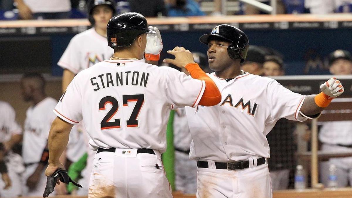 Miami Marlins outfielders Giancarlo Stanton, left, and Marcell Ozuna will represent the city and the National League at the All-Star Game at Marlins Park on July 11.