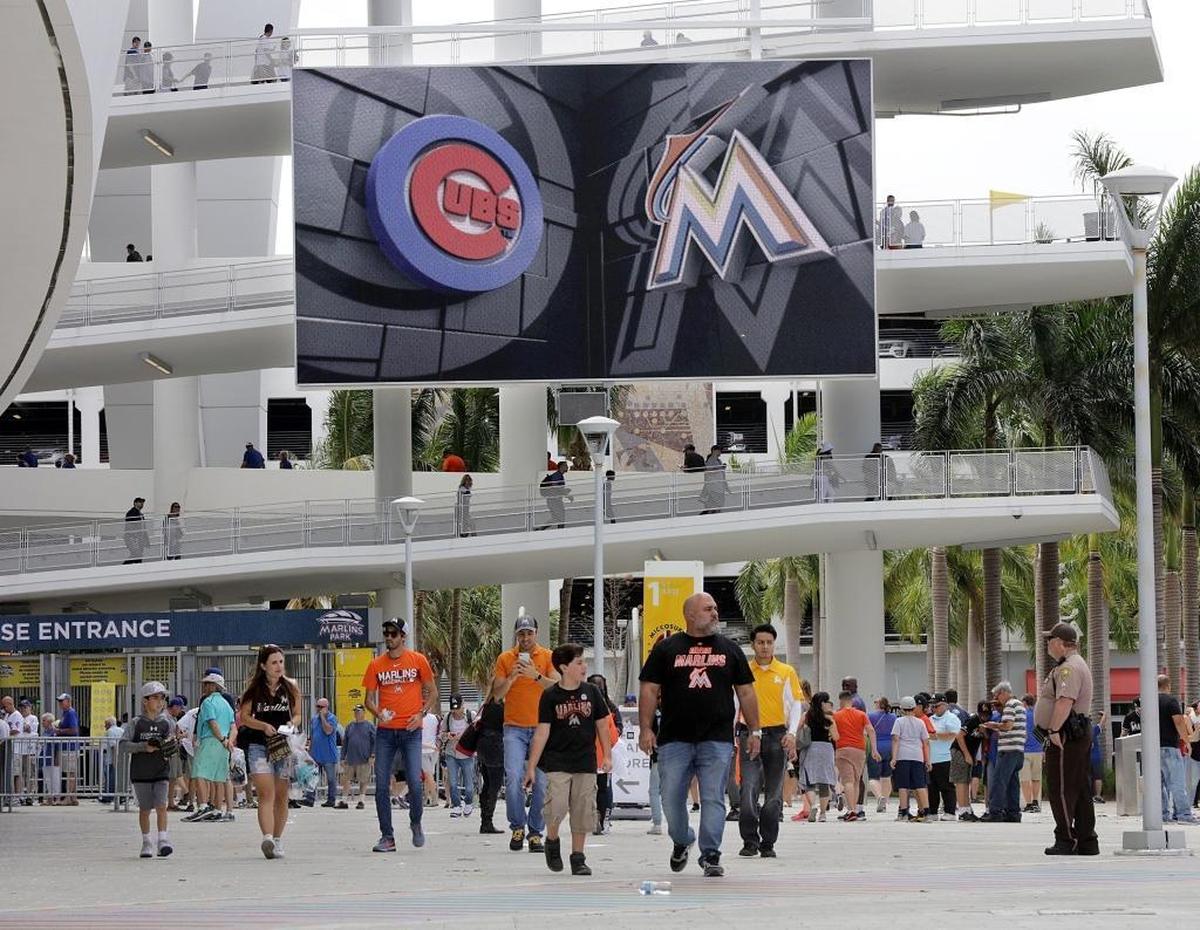 Fans arrive at Marlins Park for the Marlins’ MLB home season opener against the Chicago Cubs on Thursday, March 29, 2018.