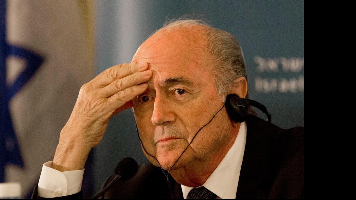 
In this May 19, 2015 file photo FIFA President Sepp Blatter attends a press conference in Jerusalem. Blatter is seeking reelection at the FIFA congress in Zurich where six soccer officials were arrested and detained by Swiss police on Wednesday, May 27, 2015 pending extradition at the request of U.S. authorities after a raid at a luxury hotel. The officials are in Switzerland for the FIFA congress and presidential election.
