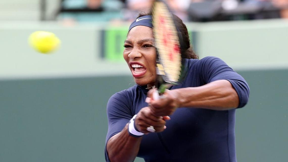 Serena Williams returns a shot against Christina McHale during a second-round match against the Miami Open at Crandon Park Tennis Center on Thursday, March 24, 2016 in Key Biscayne, Florida.
