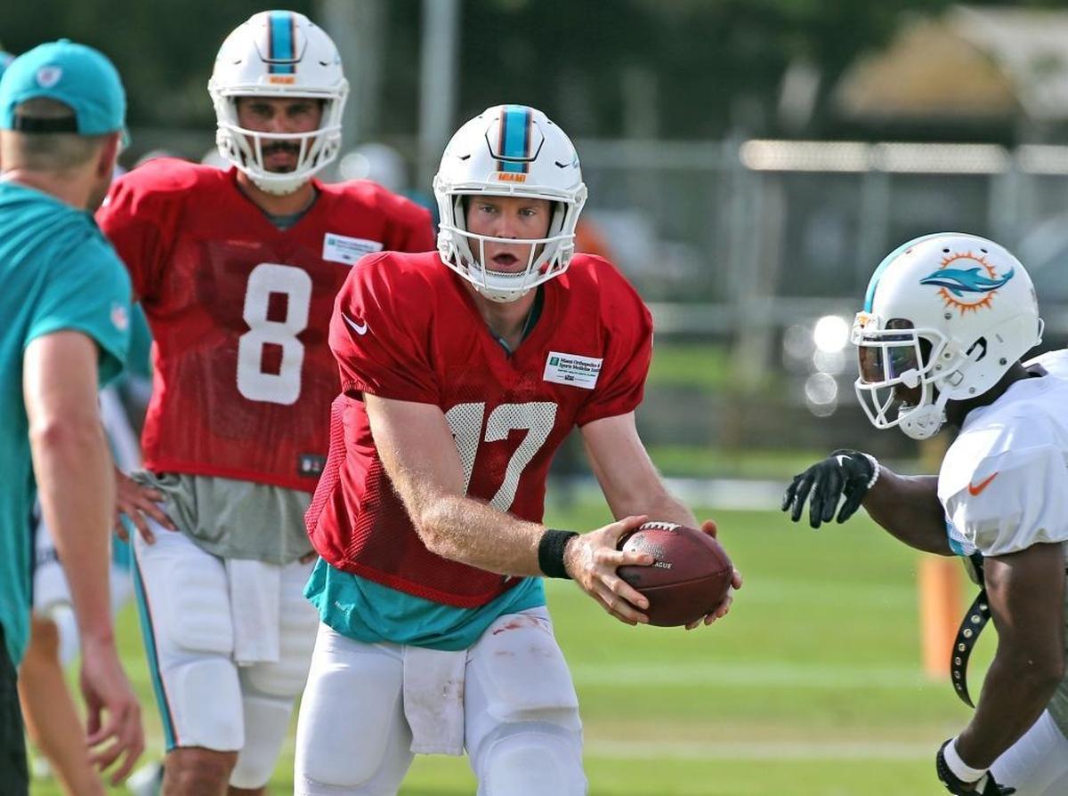 Miami Dolphins quarterbacks Matt Moore (8) with Ryan Tannehill (17) during training camp at the Miami Dolphins training facility in Davie, Fla., Thursday, Aug. 3, 2017.