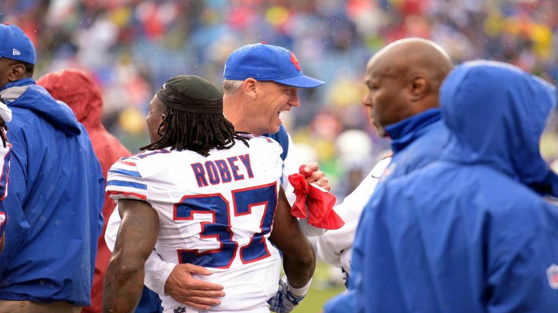 
Buffalo coach Rex Ryan hugs defensive back Nickell Robey after an the Bills beat the Colts on Sunday. Next up for the Bills at home is quarterback Tom Brady and the Patriots.
