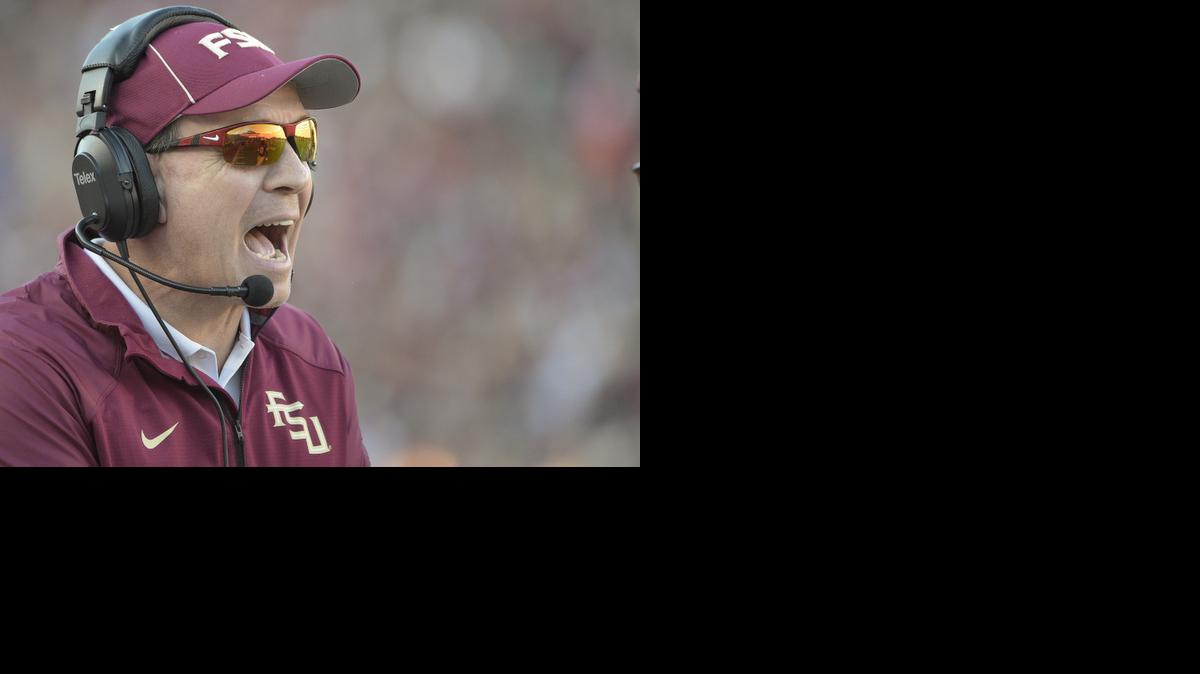 
Florida State head coach Jimbo Fisher shouts to his players during the first half of an NCAA college football game against Florida in Tallahassee, Fla., Saturday, Nov. 29, 2014. Florida State won 24-19. 
