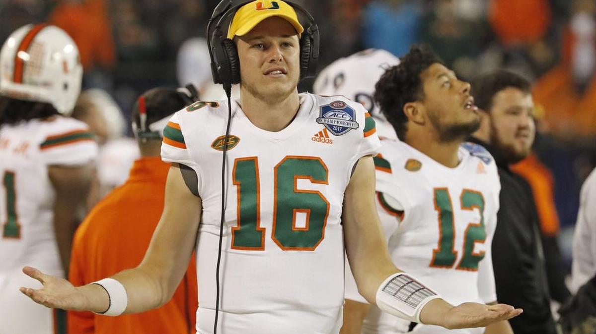 Miami Hurricanes quarterback Evan Shirreffs (16) and quarterback Malik Rosier (12) are seen on the sidelines.