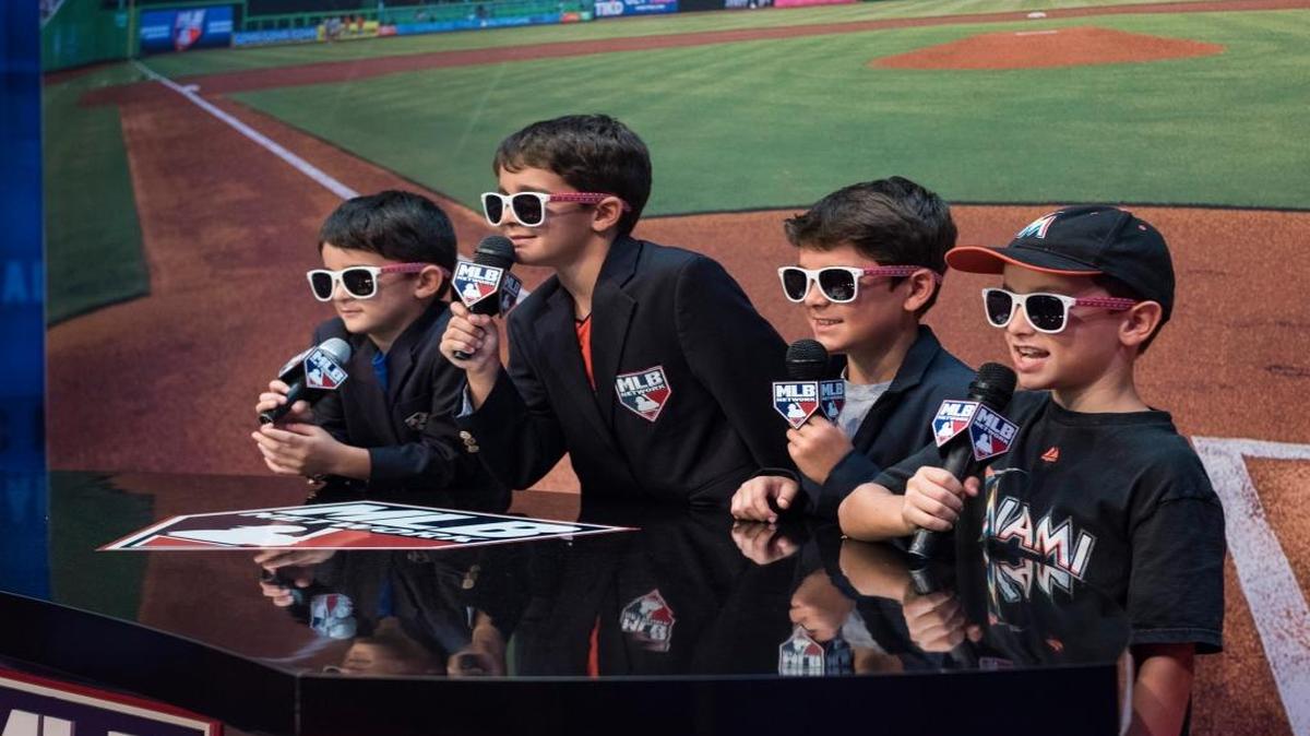 From left: Dylan Hatzis; Nicholas Hatzis; Cole Hodges; and Jackson Corrigan pose for a photo at the MLB Studio booth at the MLB All Star Fan Fest event on Saturday, July 8, 2017.