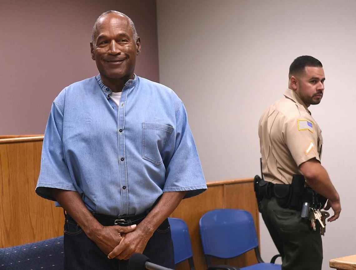 Former NFL football star O.J. Simpson enters for his parole hearing at the Lovelock Correctional Center in Lovelock, Nev., on Thurs., July 20, 2017. Simpson was convicted in 2008 of enlisting some men he barely knew, including two who had guns, to retrieve from two sports collectibles sellers some items that Simpson said were stolen from him a decade earlier.