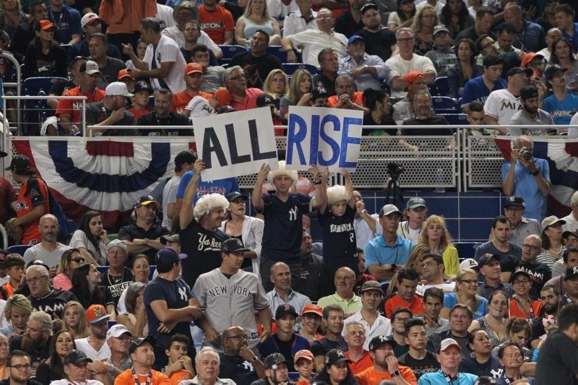 Fans showing their support to American League Aaron Judge of the New York Yankees hits during the MLB baseball All-Star Home Run Derby, Mon., July 10, 2017, at Marlins Park in Miami.