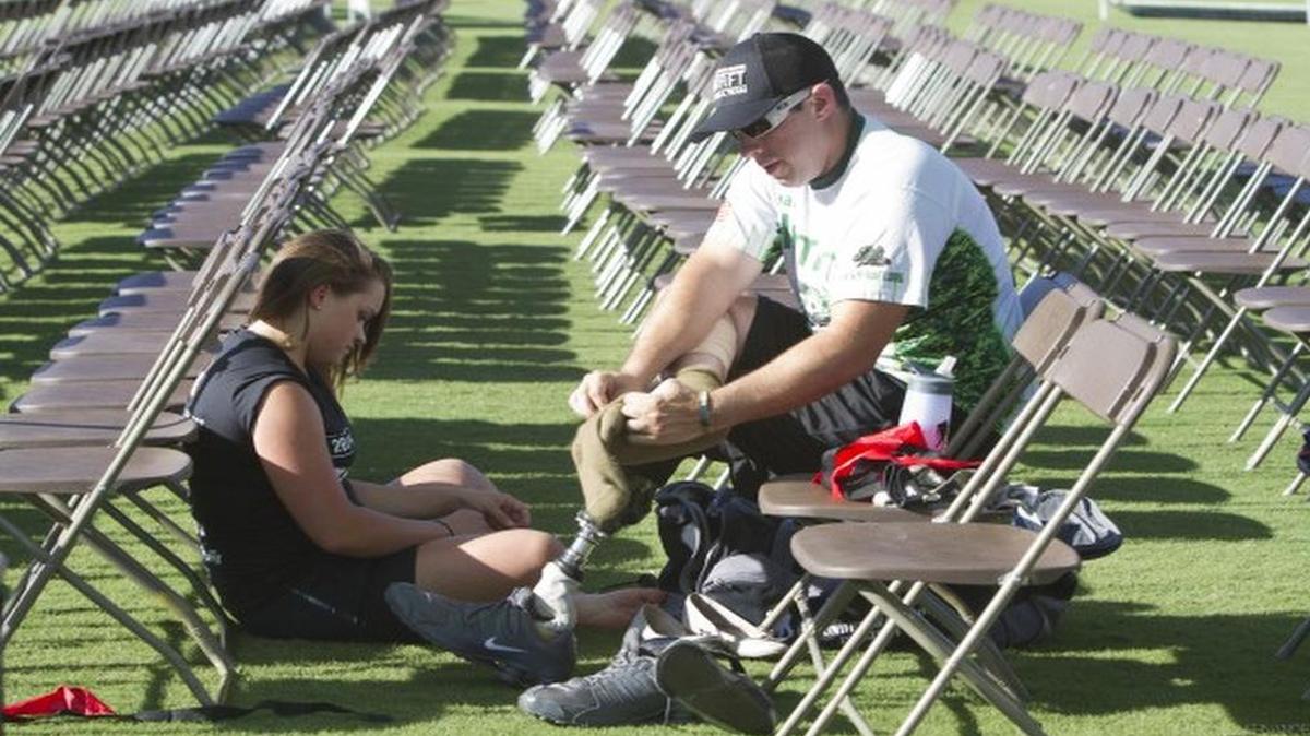 A player on the Wounded Warriors Amputee Football Team gets ready to play a game in 2014.