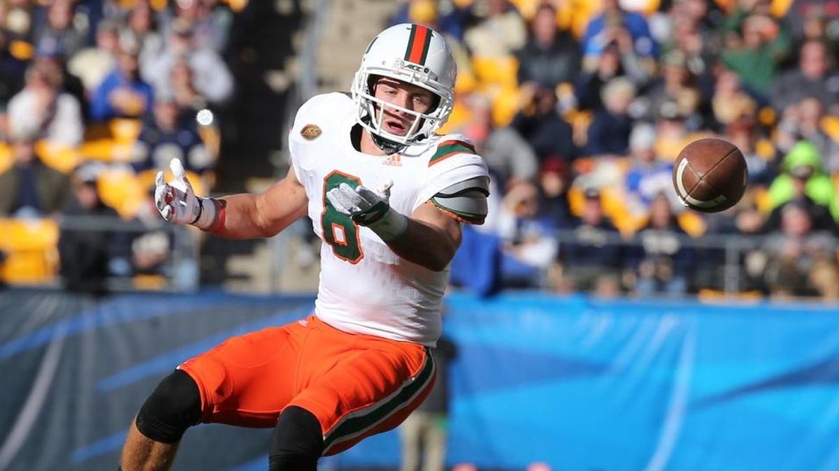 Miami Hurricanes’ Braxton Berrios (8) misses a pass in the second quarter during the Canes’ loss to the Pittsburgh Panthers at Heinz Field on Friday.