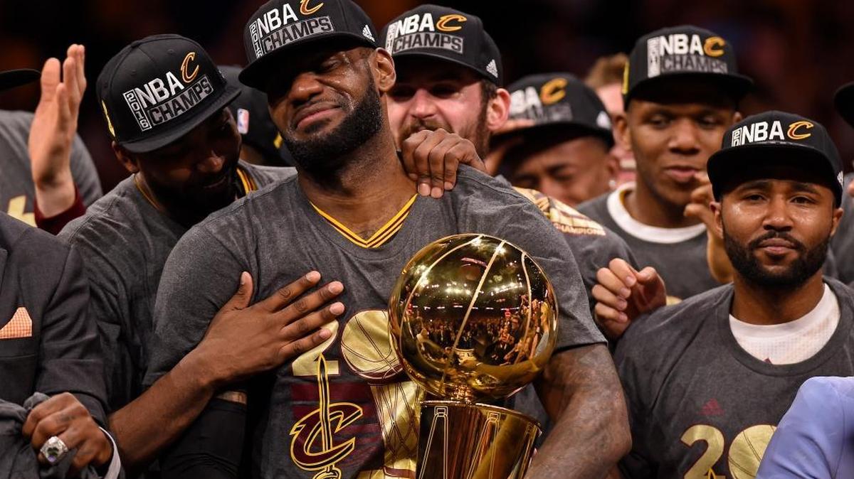 LeBron James (23) is overcome with emotion after delivering the first major sports championship to Cleveland in more than 50 years.