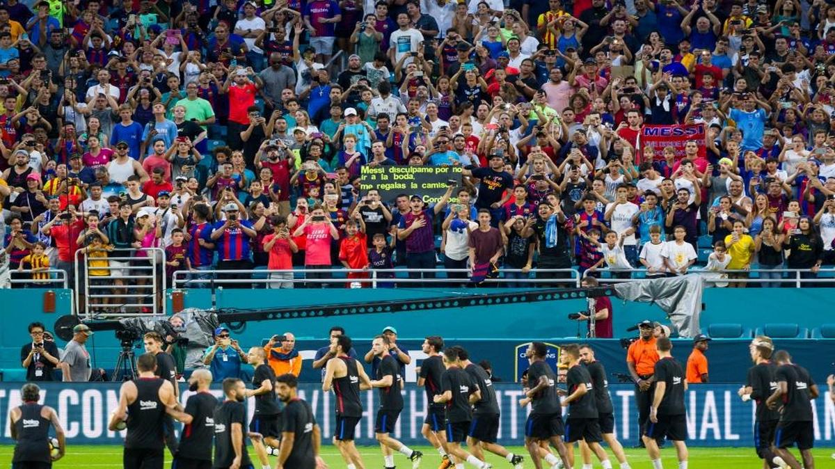 Fans look on as FC Barcelona practices at Hard Rock Stadium in Miami Gardens on Fri., July 28, 2017.