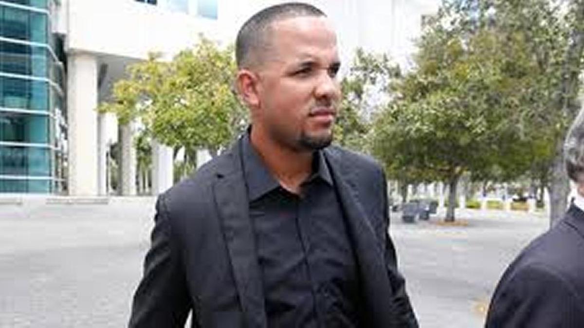 Chicago White Sox first baseman Jose Abreu leaves federal court in Miami after testifying in the trial of two men accused of illegally smuggling Cuban baseball players into the United States.