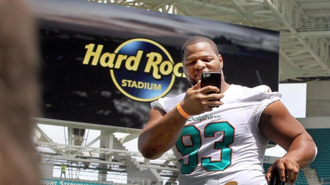 Dolphins defensive tackle Ndamukong Suh broadcasts live on social media during the announcement on Aug. 17, 2016, that the team’s home would be named Hard Rock Stadium. Suh was the only Dolphins player on ESPN’s top 100 ranking, but that doesn’t mean fans can’t be optimistic about the upcoming season.