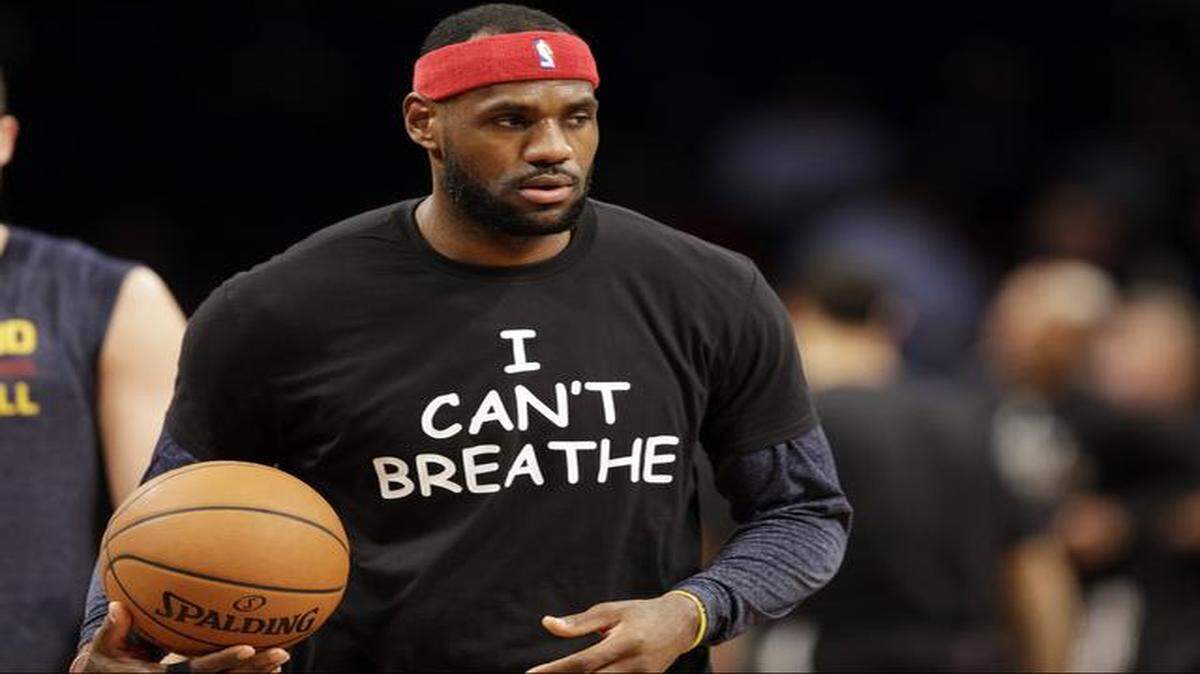 
Cleveland Cavaliers star LeBron James warms up before a game against the Brooklyn Nets on Monday, Dec. 8, 2014, in New York. Athletes have worn “I Can’t Breathe” messages in protest of a grand jury ruling not to indict an officer in the death of a New York man. 
