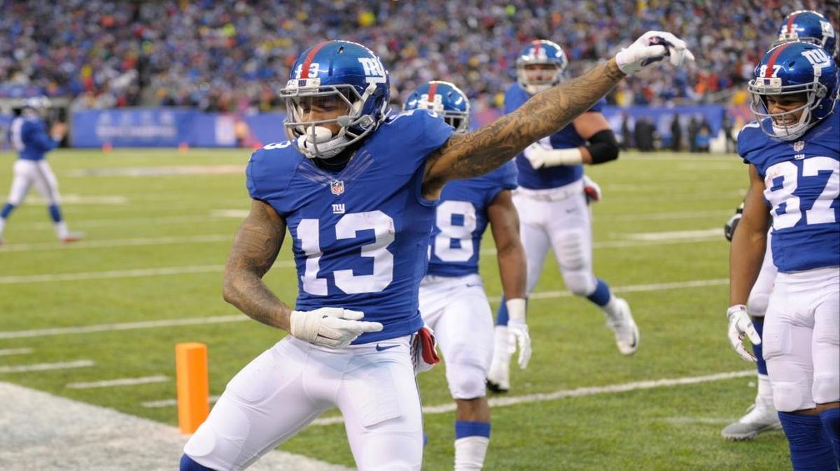 New York Giants wide receiver Odell Beckham (13) celebrates after scoring a touchdown during the second half of an NFL football game against the Detroit Lions Sun., Dec. 18, 2016, in East Rutherford, N.J.