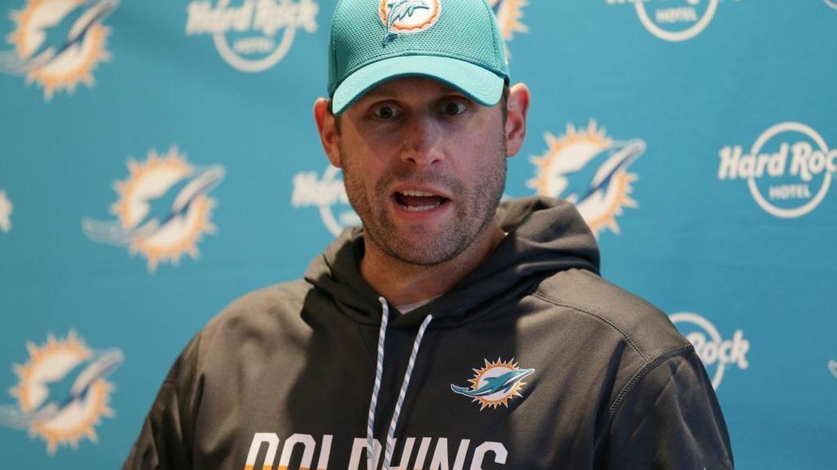 Miami Dolphins head coach Adam Gase speaks during a news conference after a training session at Allianz Park in London on Sept. 29.