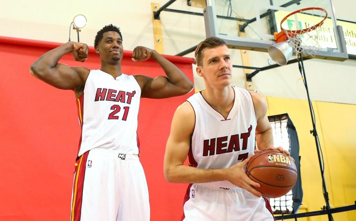 Miami Heat center Hassan Whiteside, (21) and teammate Goran Dragic laughing during the Media Day for the 2016-17 NBA season at AmericanAirlines Arena in Miami on Mon., Sept. 26, 2016.