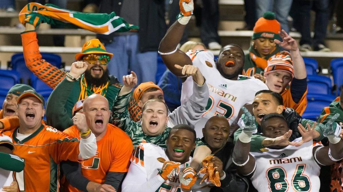 UM football players celebrate with fans after defeating Duke 30-27 in Durham, N.C., Saturday, Oct. 31, 2015.