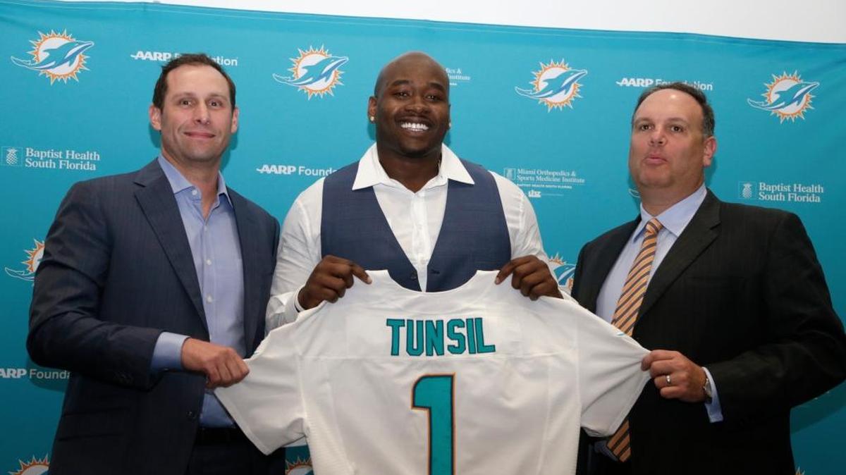 From left, first-year head coach Adam Gase, first-round pick Laremy Tunsil and executive vice president of football operations Mike Tannenbaum will be key to a Dolphins renaissance.