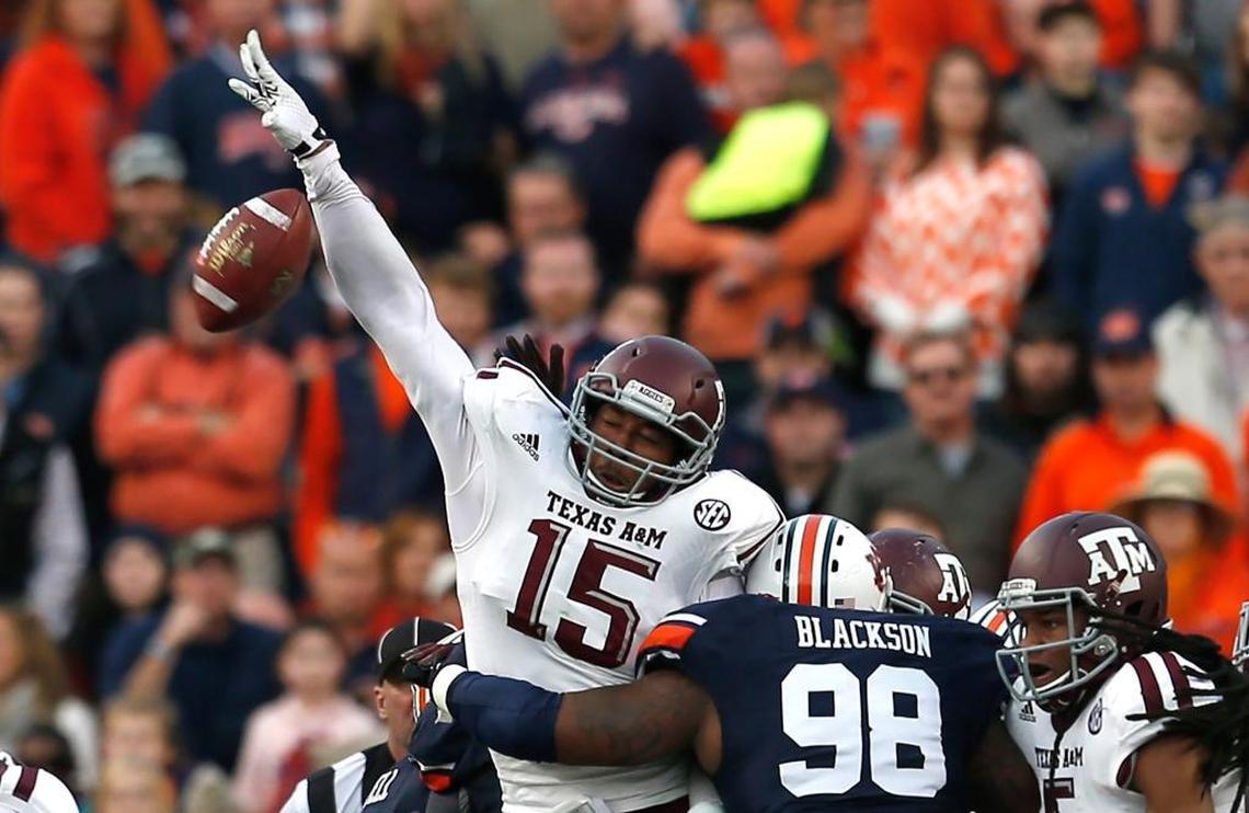 Texas A&M defensive lineman Myles Garrett blocks a field goal attempt by Auburn in 2014.