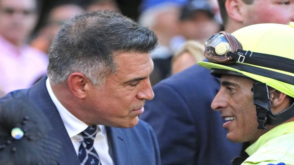 Florida Panthers owner Vincent Viola with jockey John R. Velazquez in the winners circle after Always Dreaming wins the 66th running of the Expressbet Florida Derby at Gulfstream Park in Hallandale Beach on Saturday, April 1, 2017.