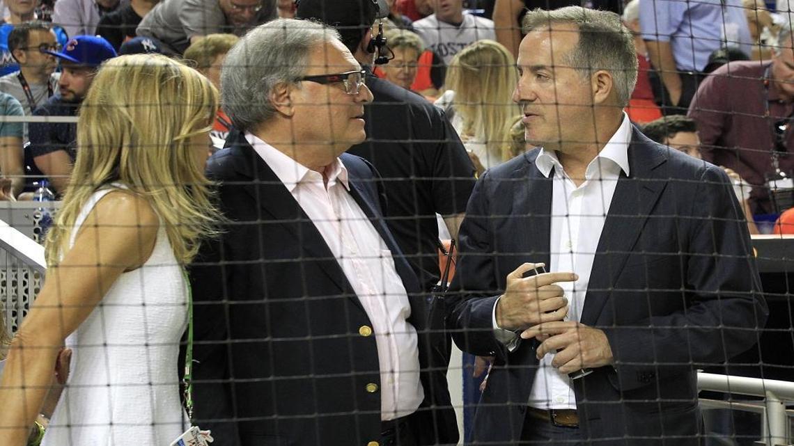 Miami Marlins owner Jeffrey Loria (center) and his wife July, chat with Cuban-American billionaire Jorge Mas, one of the bidders to buy the Miami Marlins during the MLB All-Star game between the National League and the American League on Tues., July 11, 2017, at Marlins Park in Miami.