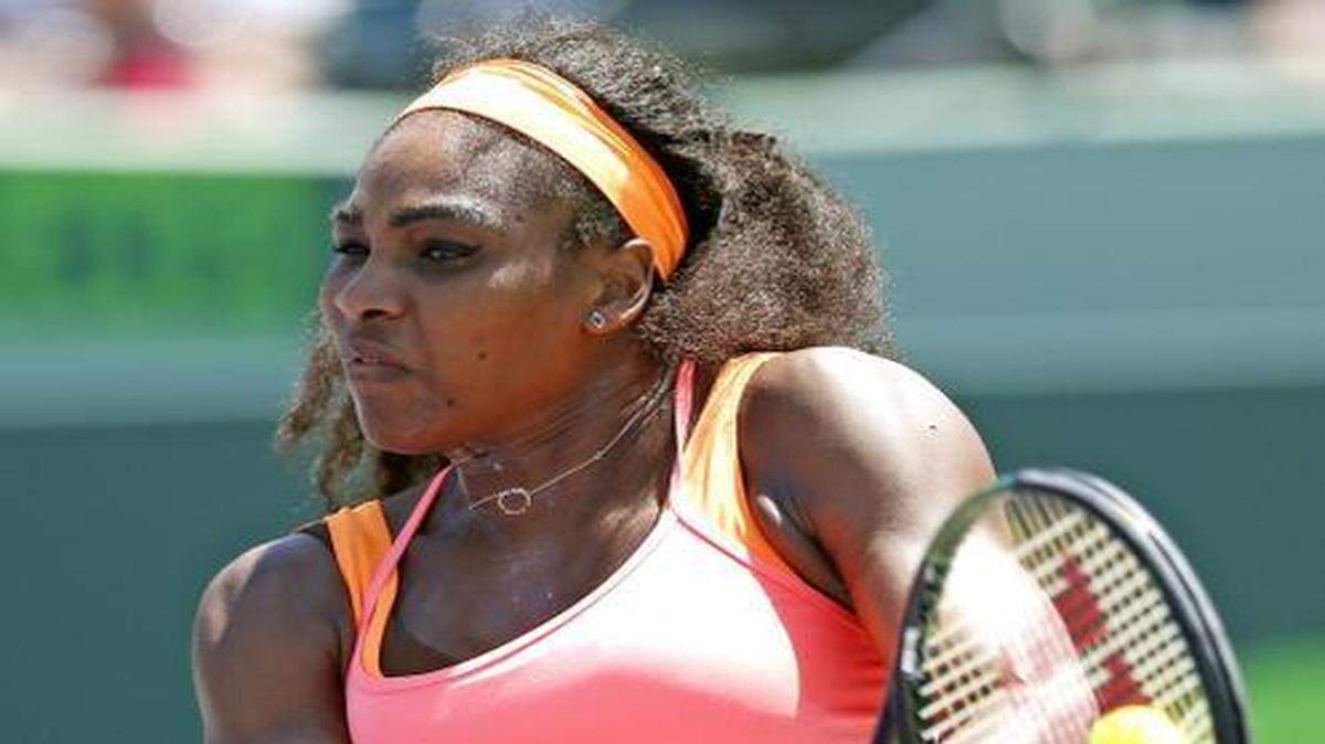 
Serena Williams returns serve as she goes on to defeat Carla Suarez Navarro of Spain to win the Miami Open, 6-2, 6-0, on April 4, 2015. The victory, which was completed in 56 minutes, secured Williams’ third consecutive title at the Crandon Park Tennis Center.
