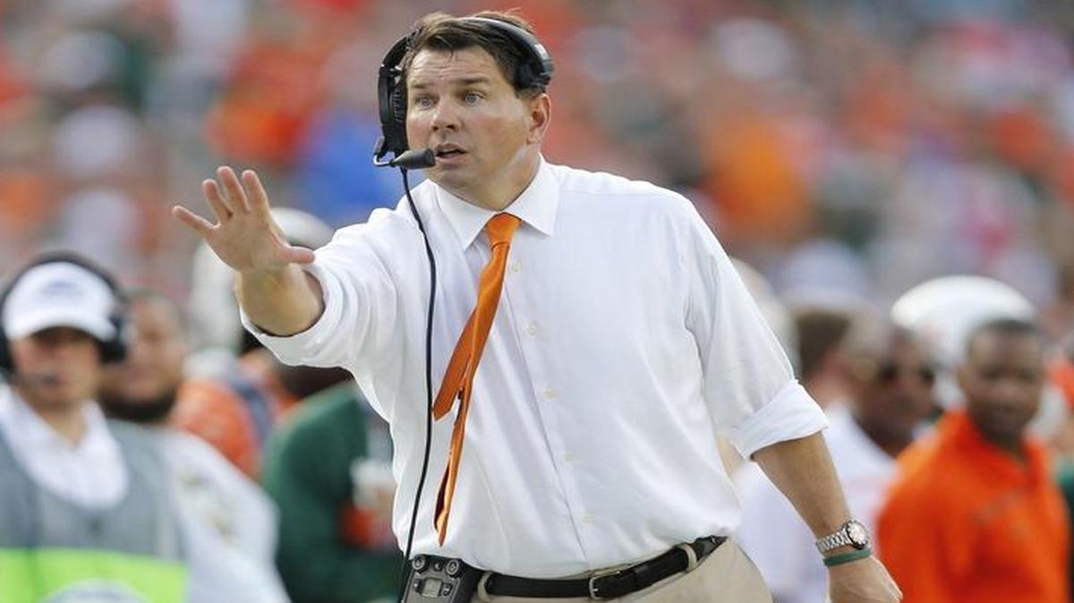 
Hurricanes coach Al Golden directs traffic during the second quarter of Saturday’s victory against Virginia Tech at Sun Life Stadium.
