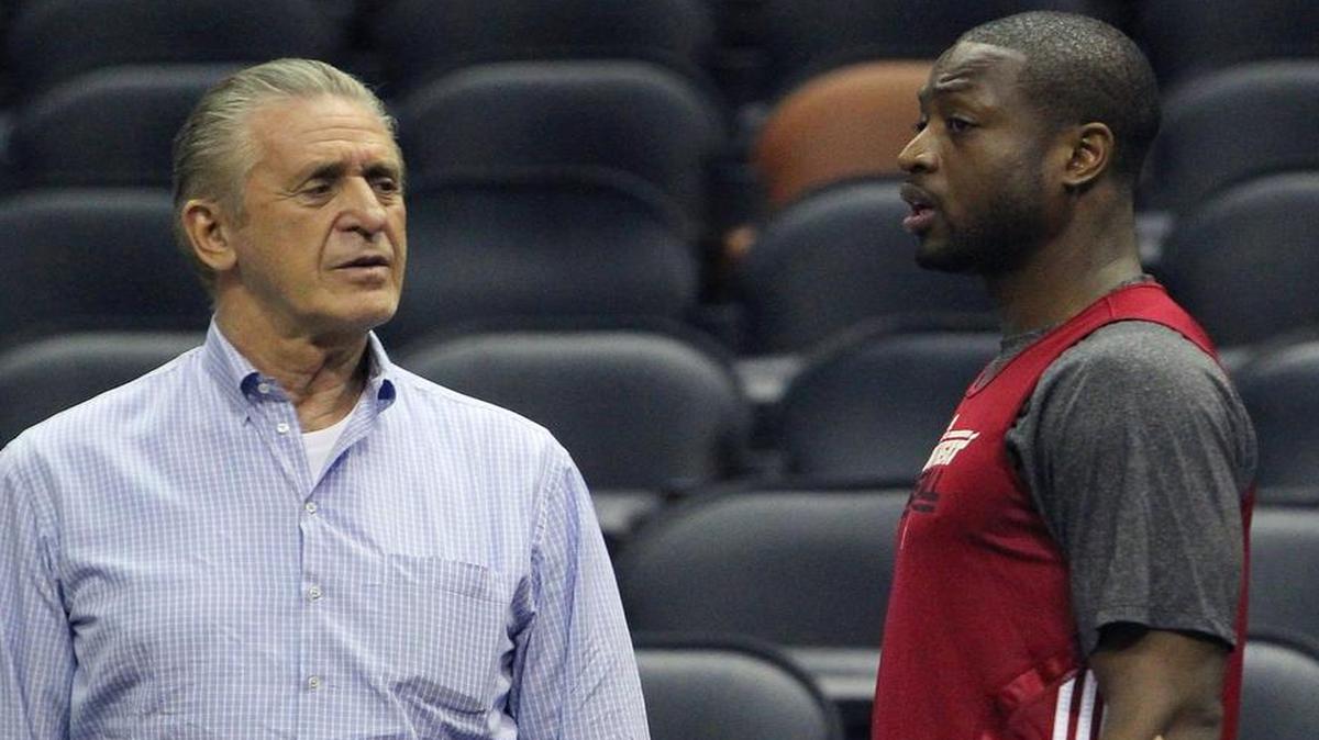 
Miami Heat president Pat Riley Heat talks with guard Dwyane Wade on June 12, 2013 in San Antonio during practice for Game 4 of the NBA Finals against the Spurs. 
