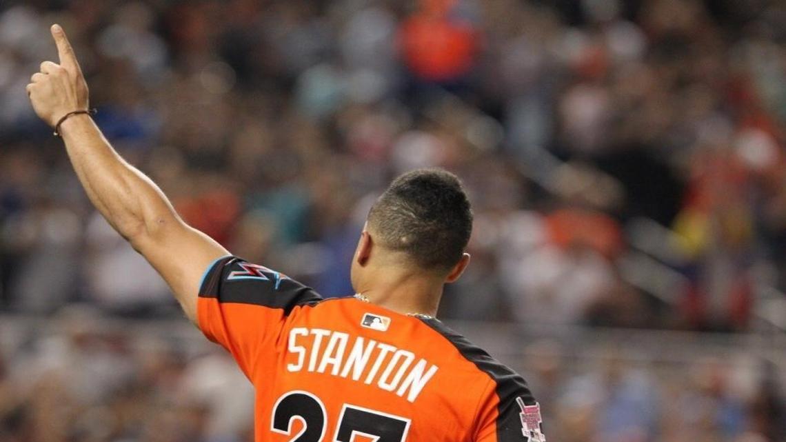 National League's Giancarlo Stanton, of the Miami Marlins, greets the fans during the MLB baseball All-Star Home Run Derby, Mon., July 10, 2017, at Marlins Park in Miami.