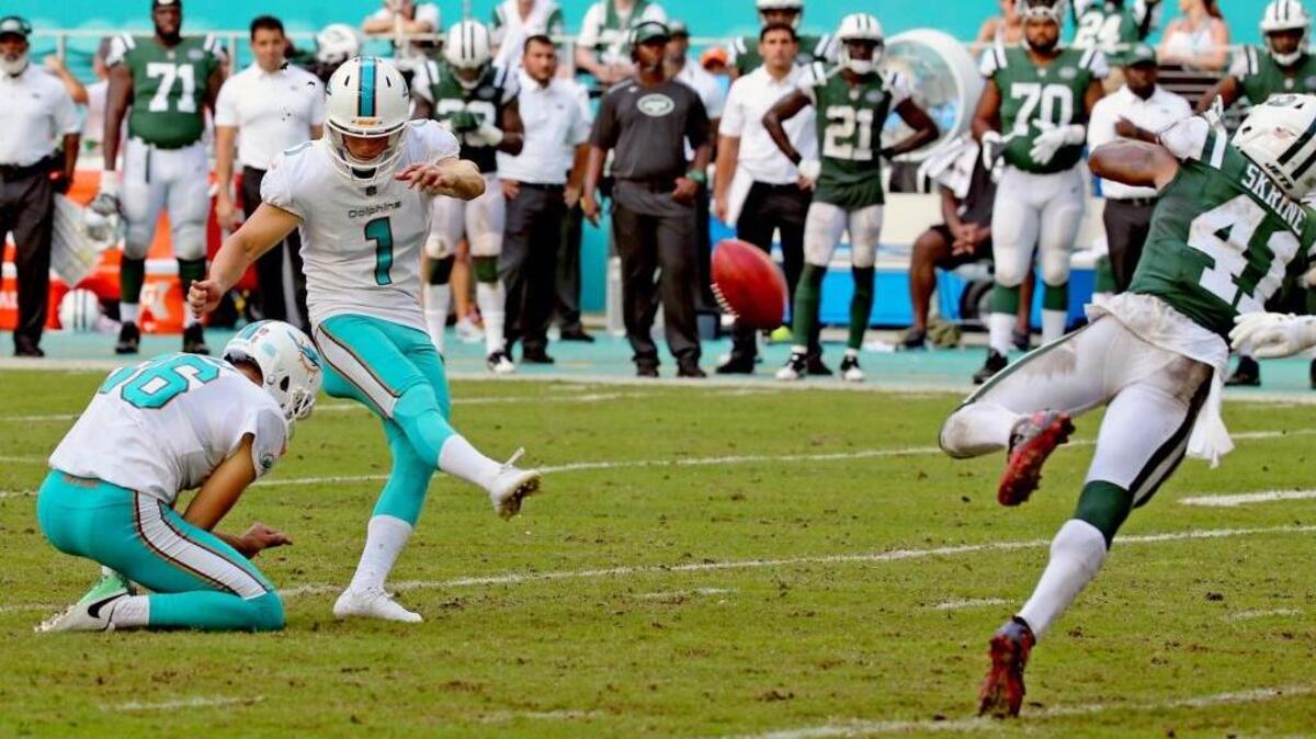 Miami Dolphins kicker Cody Parkey (1) kicks the winning field goal in the final seconds of the fourth quarter as they defeat the New York Jets at Hard Rock Stadium in Miami Gardens, Florida, Oct. 22, 2017.