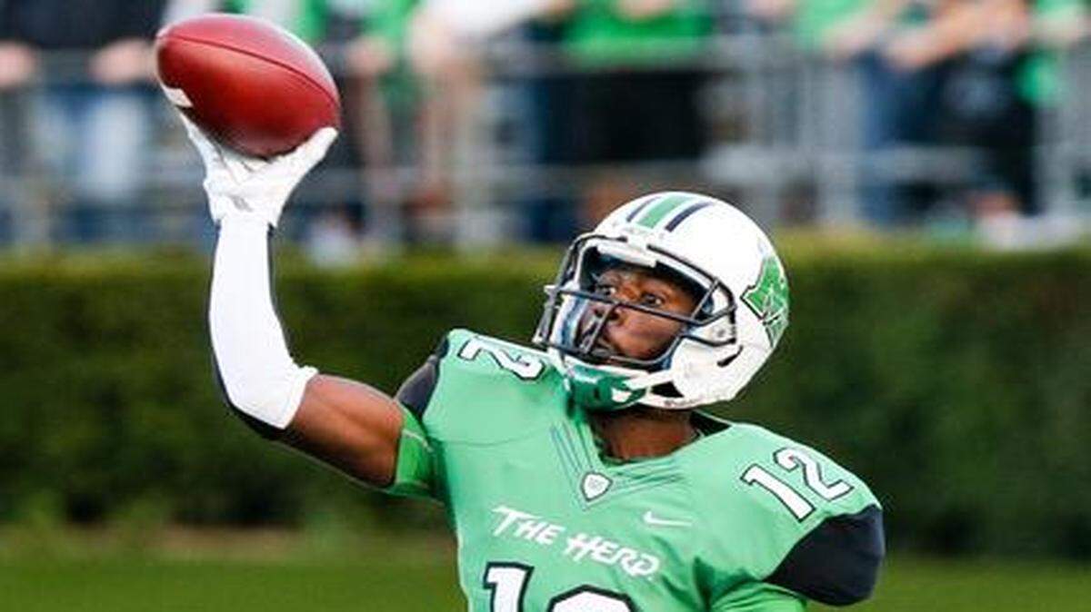 
Marshall QB Rakeem Cato throws a pass against FAU on Saturday, Oct. 25, 2014 in Huntington, West Virginia.
