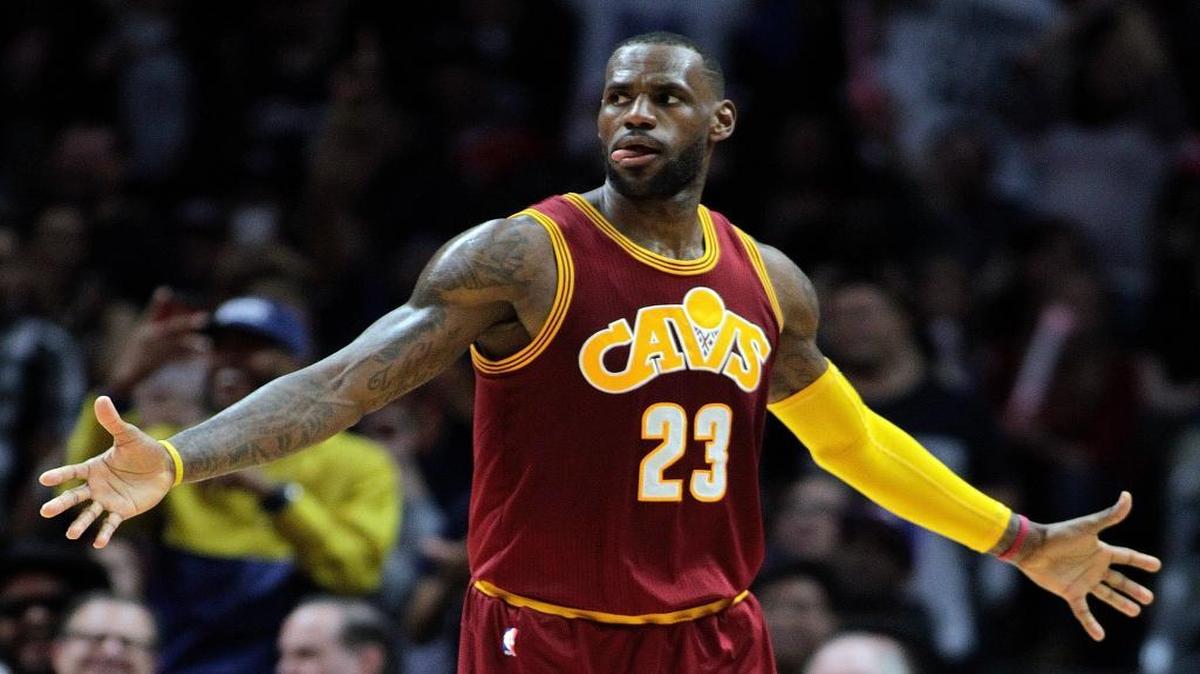 Cleveland Cavaliers forward LeBron James reacts after dunking during the first half of an NBA basketball game against the Los Angeles Clippers in Los Angeles, Sunday, March 13, 2016.