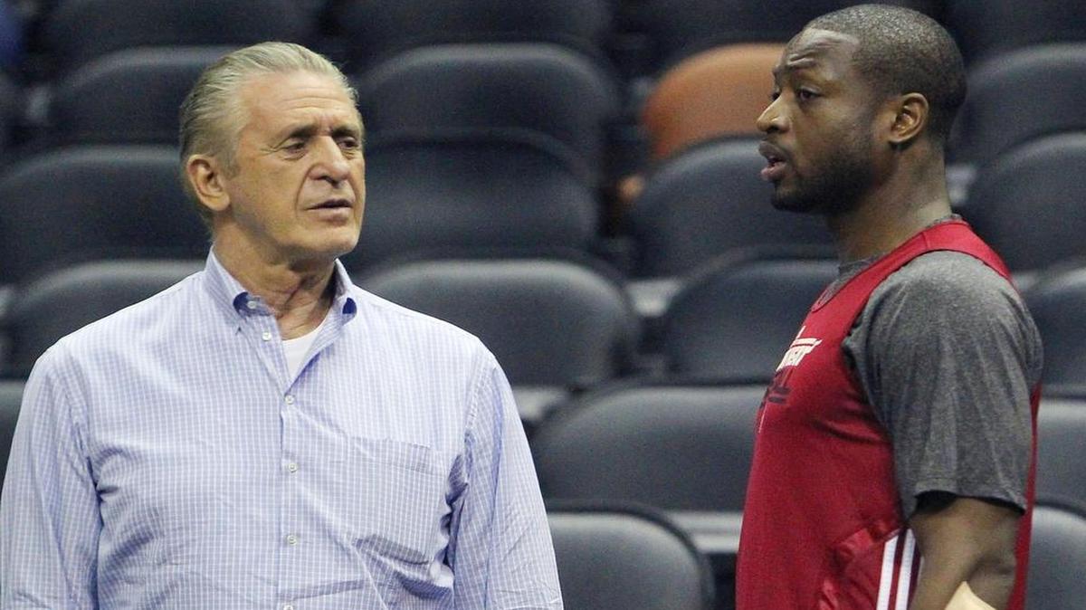 
By signing a one-year deal, Dwyane Wade, right, gives Pat Riley and the Heat front office flexibility for next season. 
