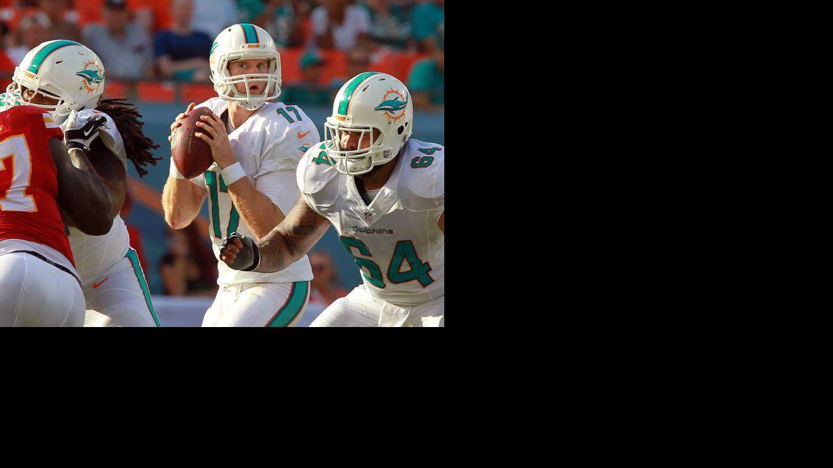 
Miami Dolphins quarterback Ryan Tannehill looks for a receiver in the first quarter against the Kansas City Chiefs at Sun Life Stadium in Miami Gardens, Fla., on Sunday, Sept. 21, 2014. 
