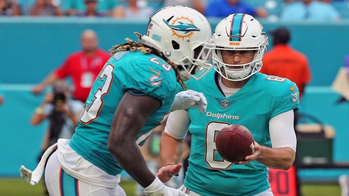 Dolphins quarterback Jay Cutler (6) hands the ball off to Jay Ajayi (23) as the Miami Dolphins play the Baltimore Ravens in their second preseason game at Hard Rock Stadium in Miami Gardens on Aug. 17, 2017.