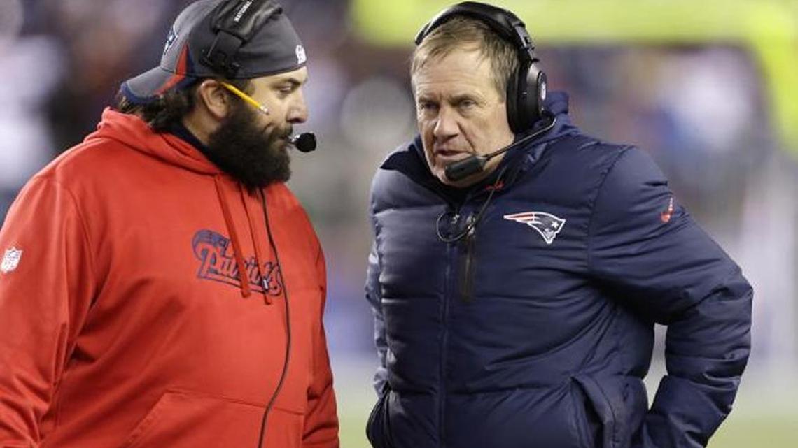 Patriots coach Bill Belichick is seen speaking to his defensive coordinator, Matt Patricia. We believe Bill is cursing.