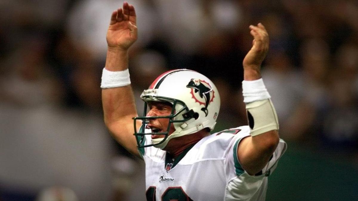 Dan Marino celebrates after handing off for the game-winning touchdown late in the fourth quarter of the AFC Wild Card game against the Seattle Seahawks on Jan. 9, 2000.