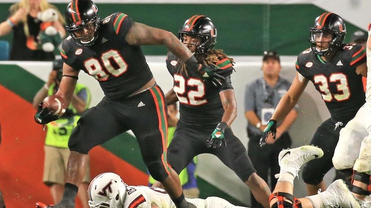 Miami Hurricanes defensive lineman RJ McIntosh (80) recovers a fumble for a turnover in the second quarter as the University of Miami hosts Virginia Tech Hokies at Hard Rock Stadium on Sat., Nov. 4, 2017.